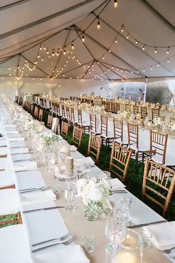 tented event setup with lighting