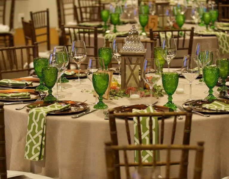 green tableware matching corporate event theme