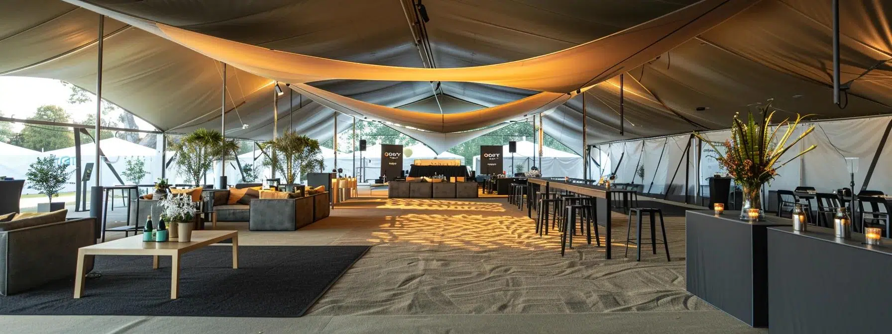a polished corporate event under an elegantly arranged tent, showcasing uniform branding elements, sophisticated lighting, and a tastefully designed interior, all reflecting a high standard of professionalism and commitment to excellence.