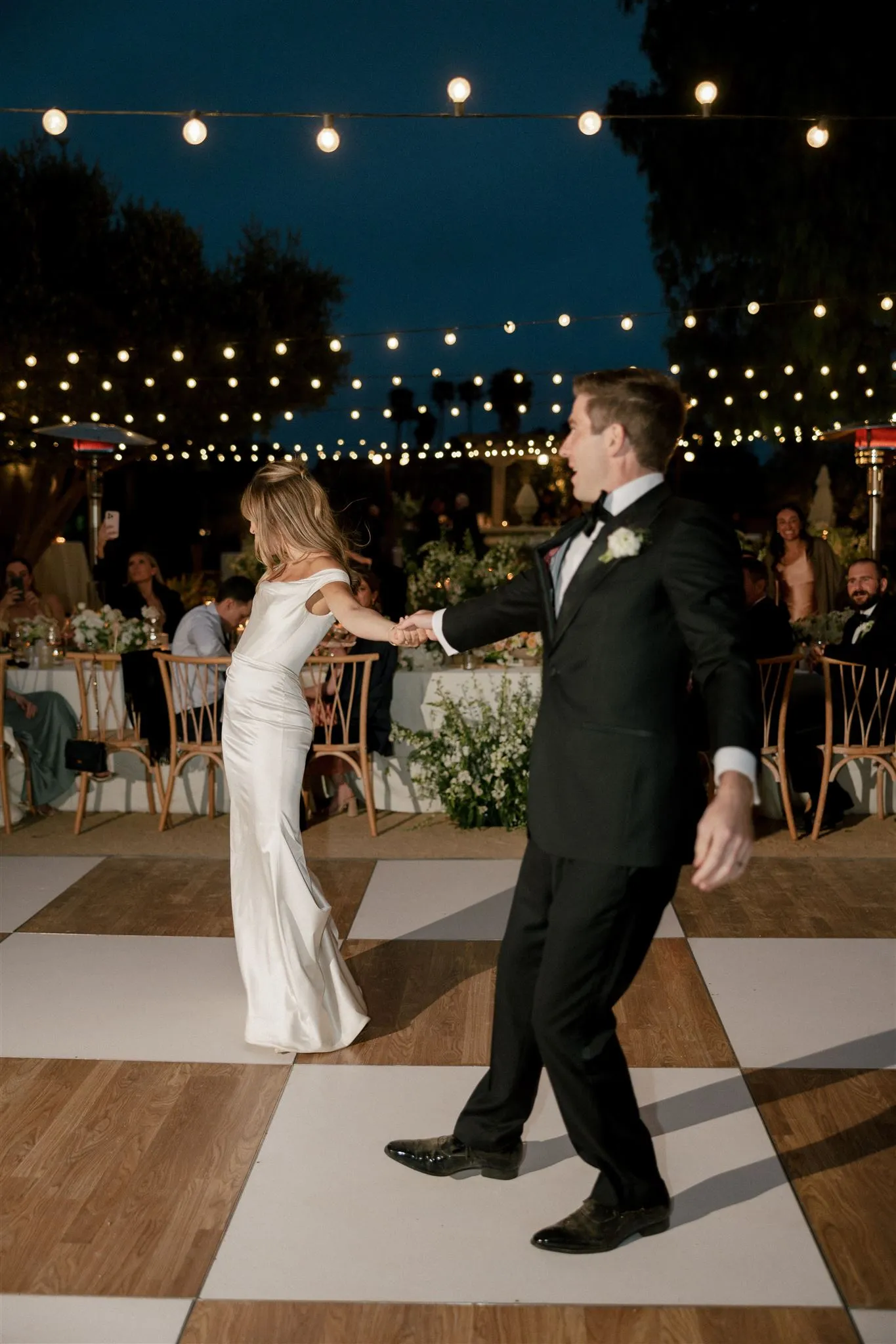 Groom and bride dancing at their reception
