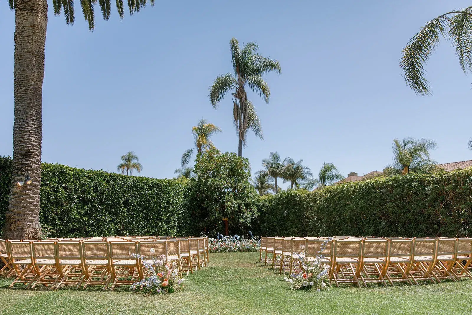 stack of bamboo chairs for event
