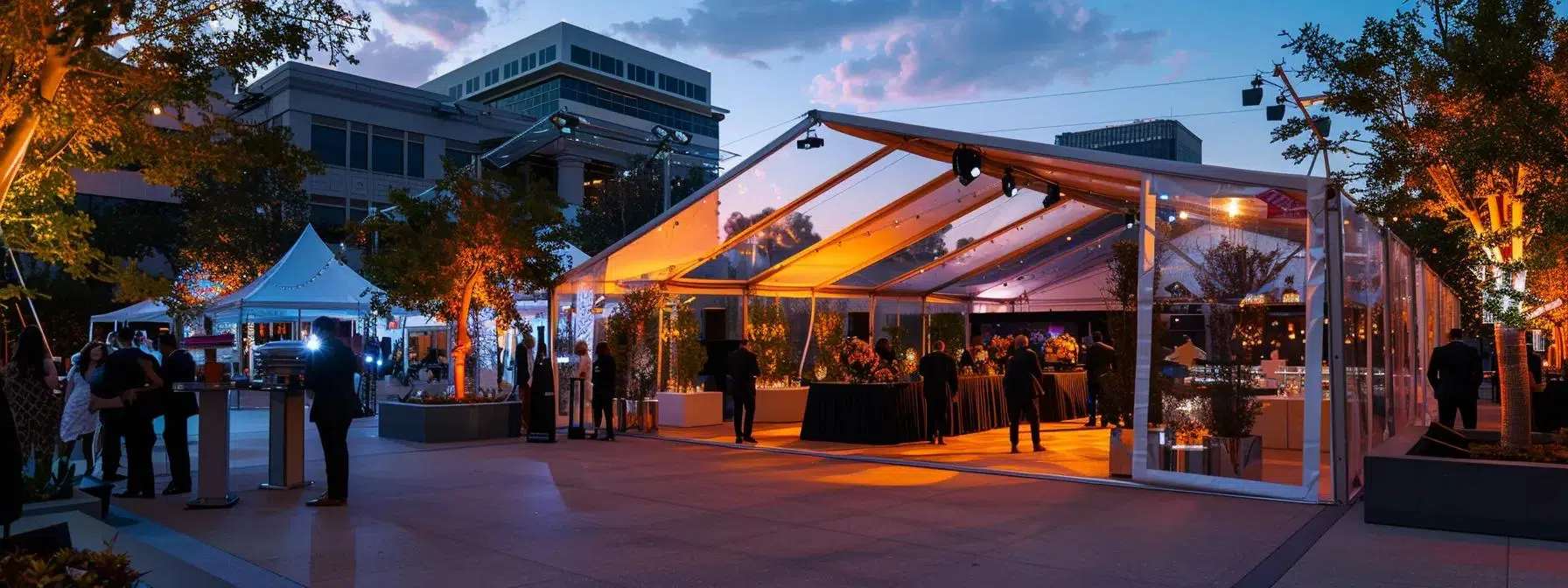 a sleek all-weather event tent featuring a modern design stands prominently in a bustling urban event space, showcasing guests comfortably enjoying a vibrant gathering under its robust, weather-resistant canopy amidst an array of sophisticated decorations and ambient lighting.