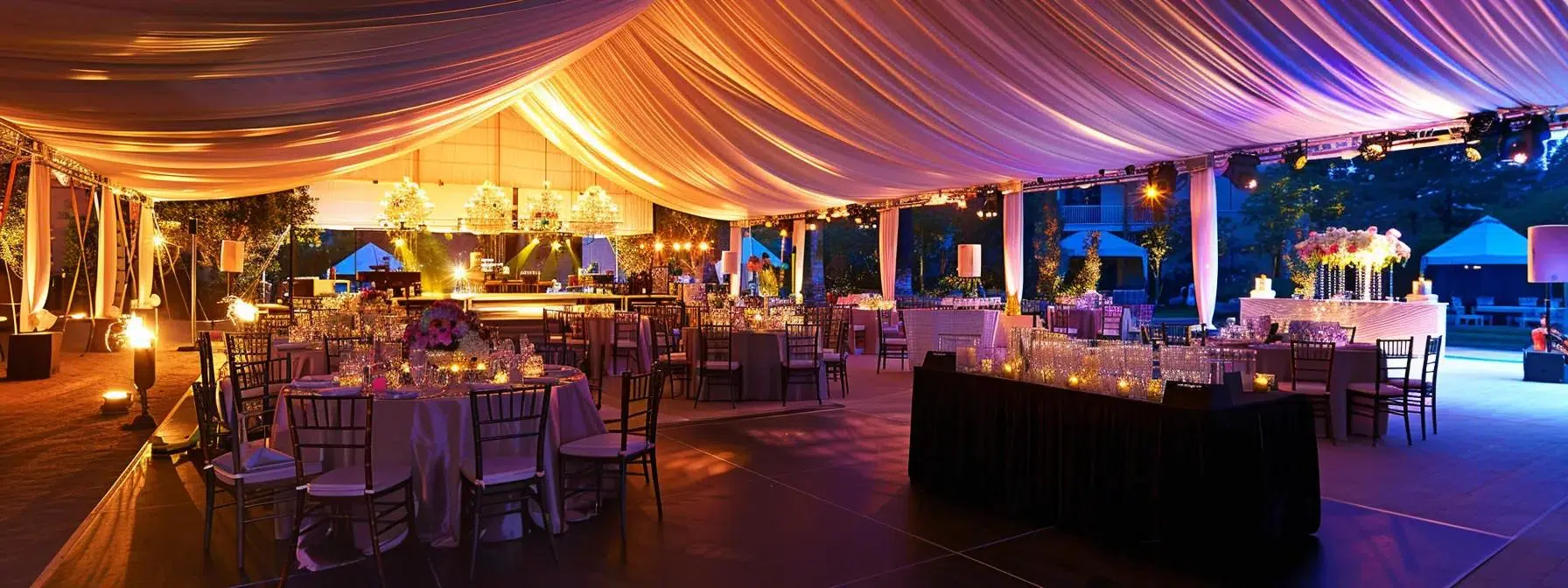 a sleek, modern event tent interior showcases vibrant lighting, elegant polyester drapery, and effective climate control solutions, creating a welcoming atmosphere amidst a sophisticated setup for an upscale gathering.