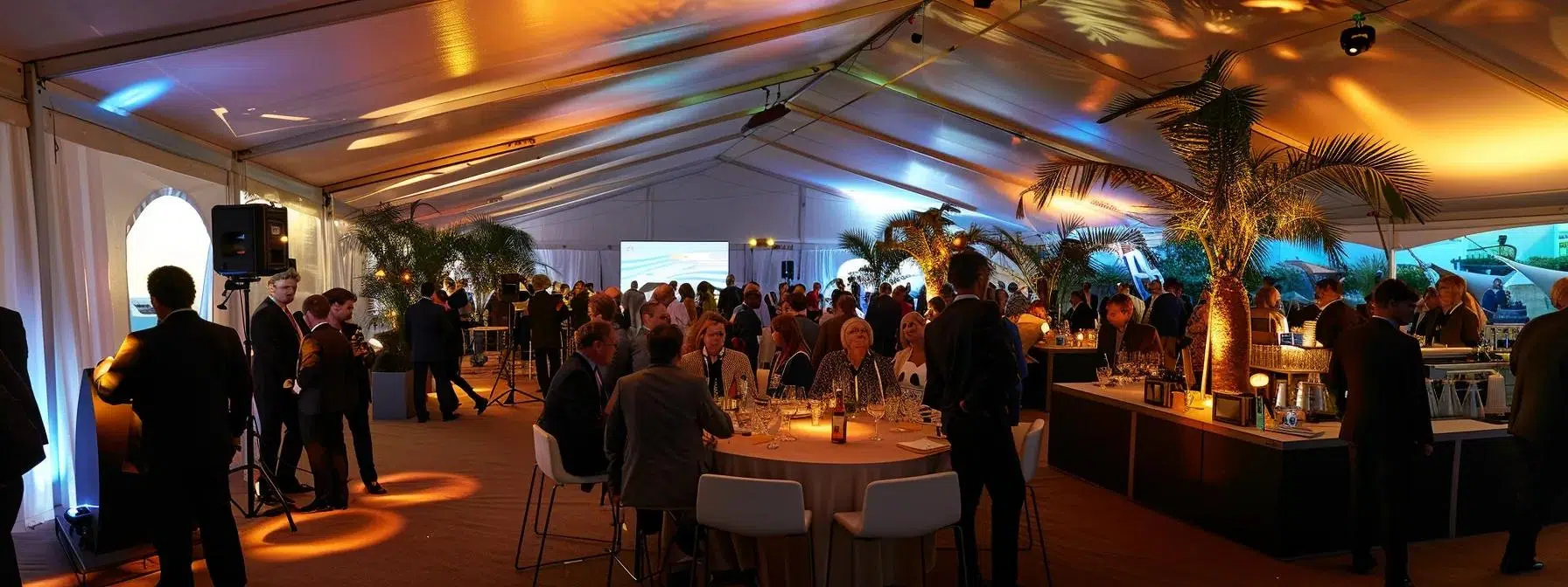 a sophisticated tented venue filled with elegantly dressed guests enjoying a seamless corporate conference, showcasing high-tech climate control systems subtly integrated into the design, illuminated by soft, ambient lighting that emphasizes a comfortable and inviting atmosphere.
