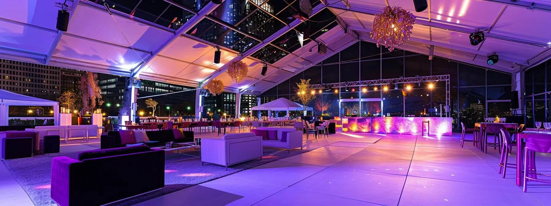 a vibrant event space is elegantly set up with a spacious, stylish tent, showcasing polished flooring, ambient lighting, and sophisticated furnishings that cater to a diverse guest count under a sleek urban skyline.