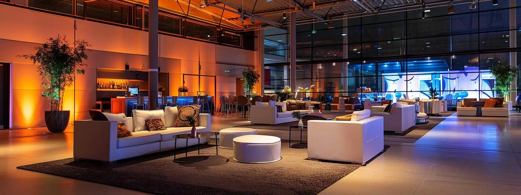 a visually striking event space showcases a blend of elegant statement furniture, meticulously arranged to enhance the atmosphere of a sophisticated corporate gathering, with ambient lighting casting a warm glow on sleek modern decor.