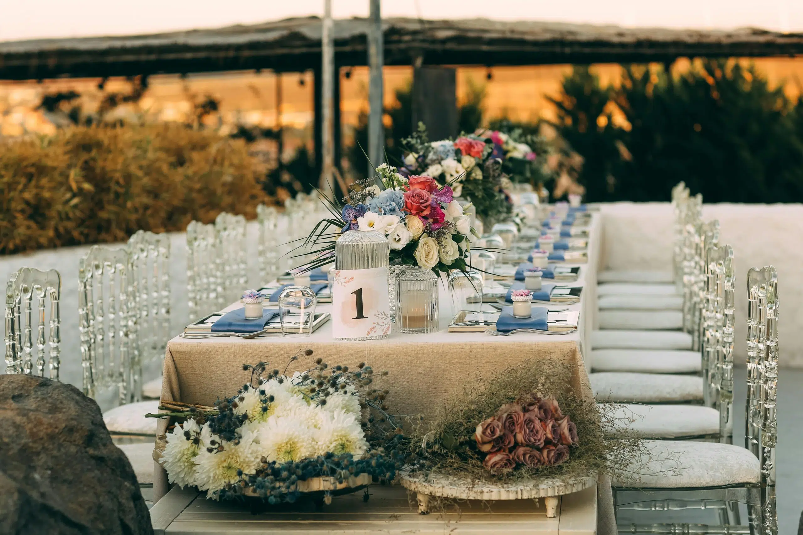 flower arrangement on a table with event setting
