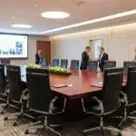 Elegant corporate event furniture setup with ergonomic chairs and sleek tables