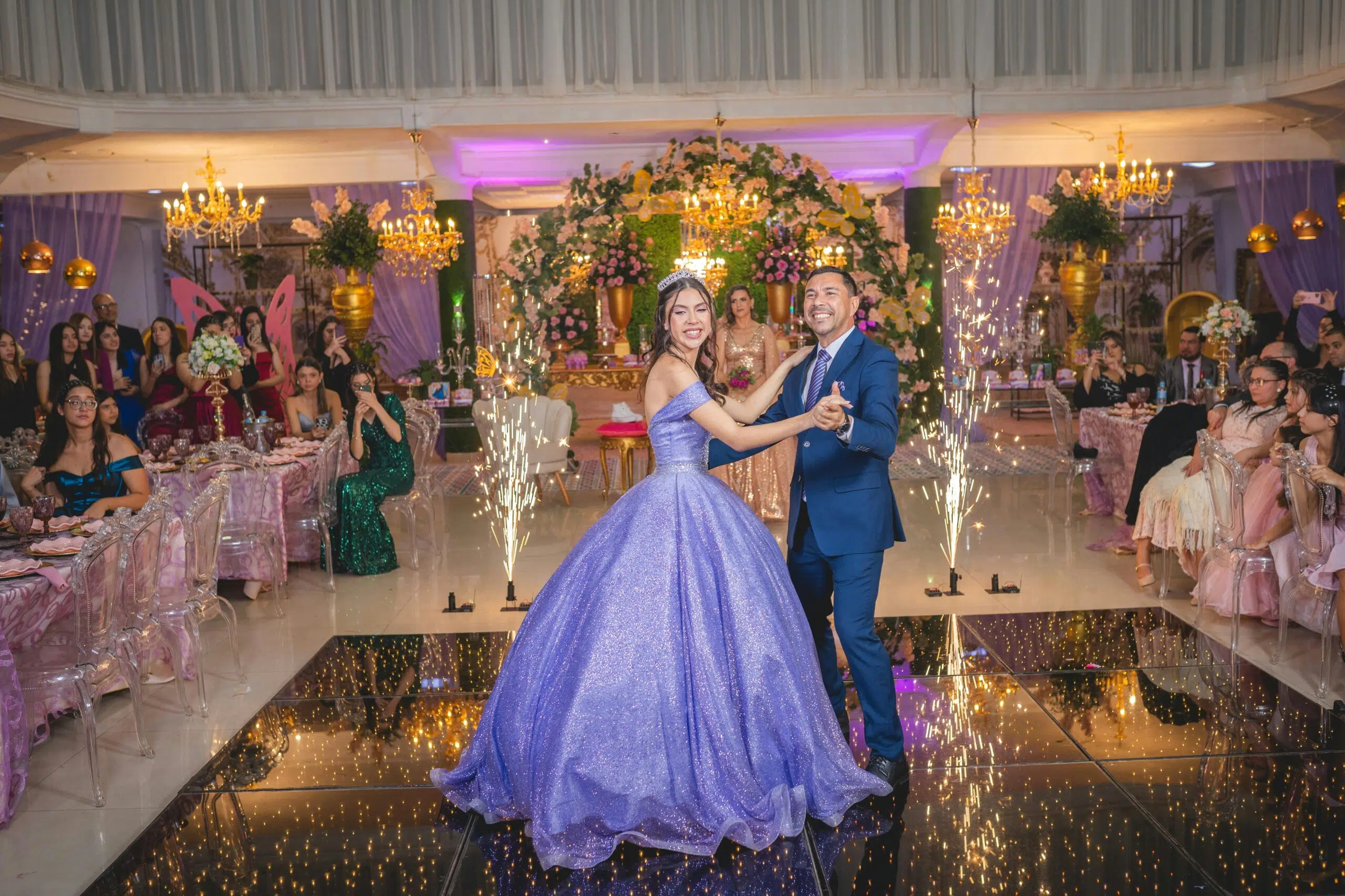 newlyweds dancing on the dance floor setup for the wedding event