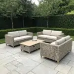 Luxurious party furniture setup showcasing elegant sofas and chic dining arrangements