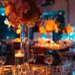 a sleek, modern event space elegantly decorated with sophisticated table settings and ambient lighting, showcasing polished details that elevate the overall atmosphere of a high-profile gathering.
