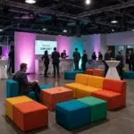 Corporate event furniture rentals promoting networking and collaboration in a modern venue