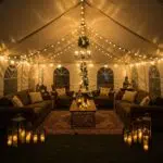 Cozy winter tent setup in Los Angeles with warm lighting and festive decorations