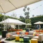 Elegant corporate event setup in Southern California with stylish tents and furniture