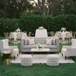 Elegant lounge setup with plush sofas and stylish chairs in a Santa Barbara outdoor venue