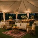 Elegant outdoor home event setup with stylish furniture and decor
