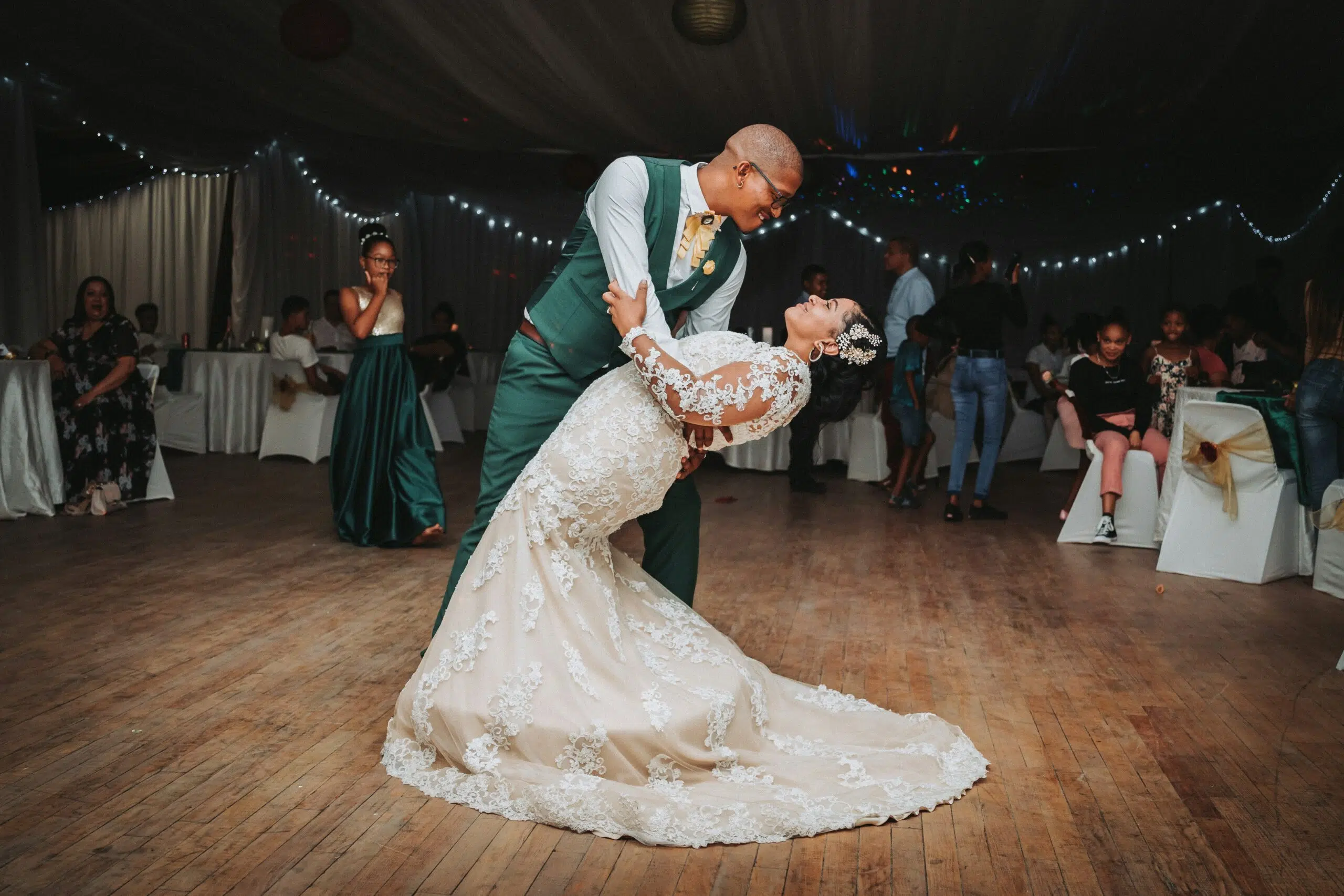 a couple dancing on the floor