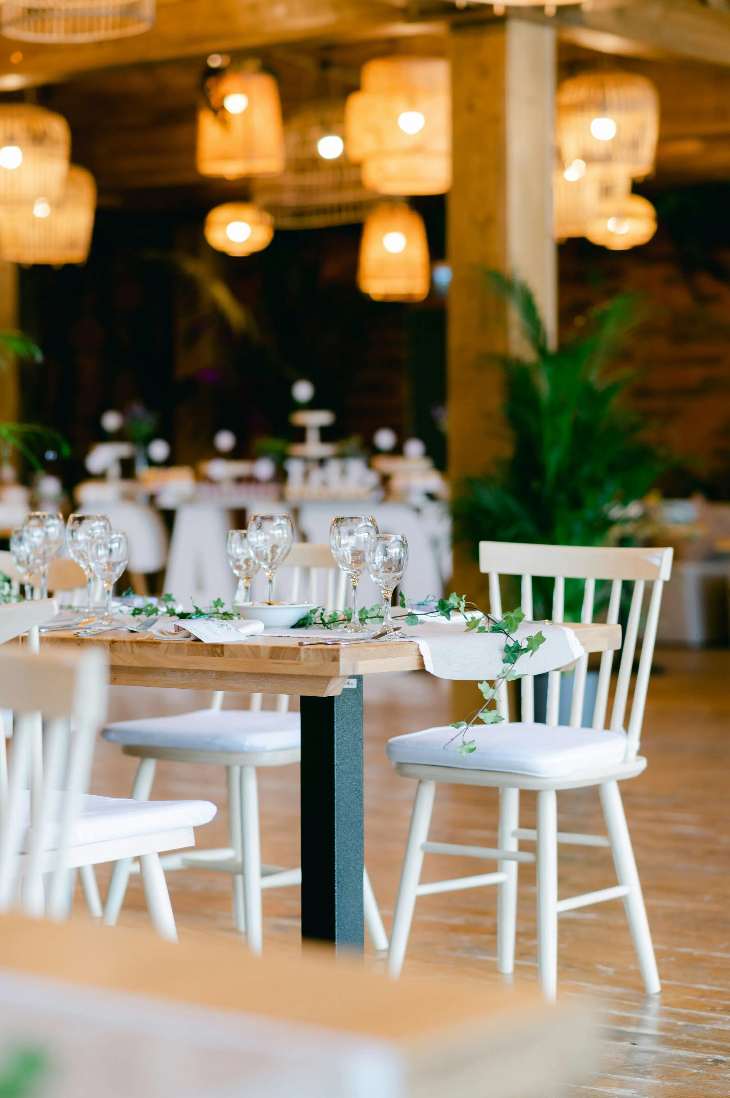Elegant outdoor wedding tables arranged for a coastal California event