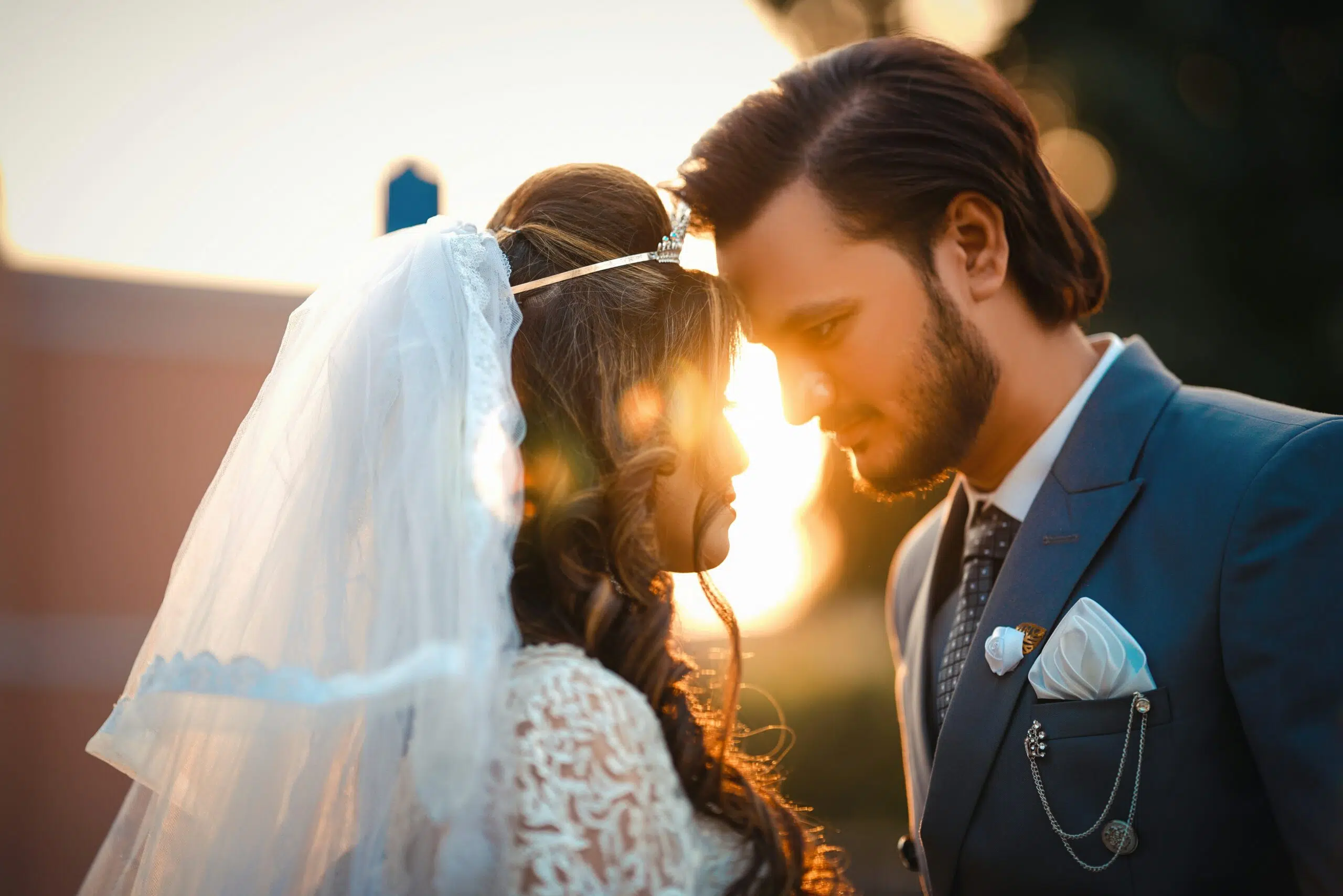 Bride and groom smiling together at their wedding