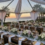 Outdoor wedding setup in Santa Barbara with elegant tables and tents