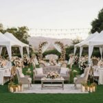 Outdoor wedding setup in Santa Barbara with elegant tents and stylish furniture
