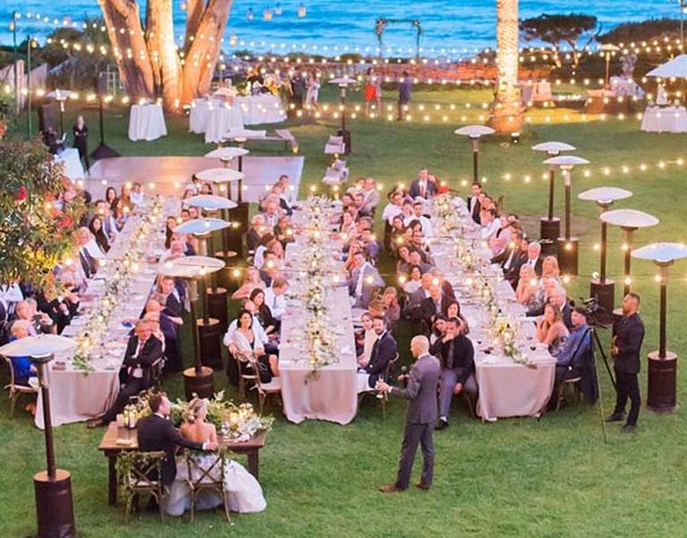 string lights over outdoor event setup