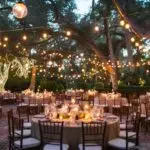 outdoor wedding venue, lighting, chairs and tables