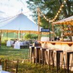 outdoor wedding tent, chairs and tables, bar